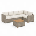 Set divano angolare da giardino 5 posti grigio in polyrattan con cuscini color crema e tavolino 225 x 175 x 65 cm